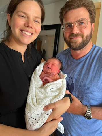 Alumnus Laura Stanley with Ben Horan and their new baby Alexandra, class note