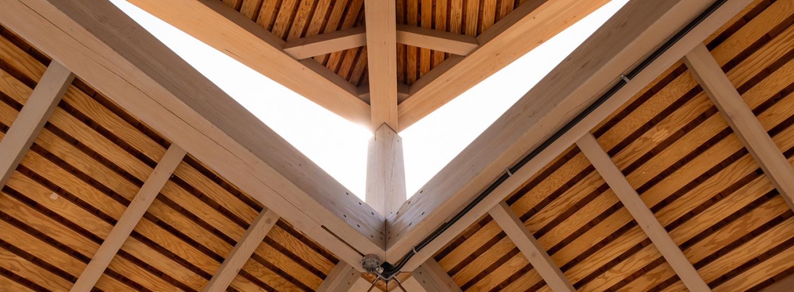 A closeup photo of the ceiling woodwork on the Indigenous Gathering Space.