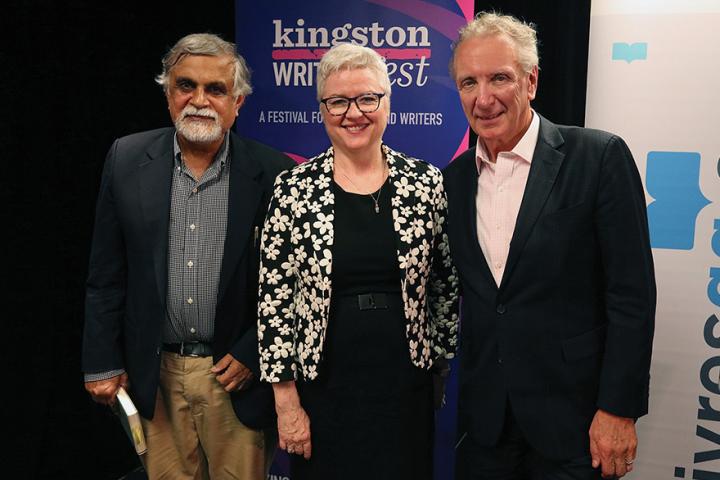 Barbara Bell, centre, with with writer M.G. Vassanji and past KWF chair Eric Friesen at a 2019 event.