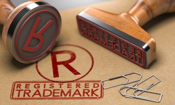 Stamp that says registered trademark