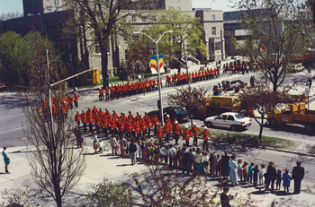 [photo of the Sesquicentennial anniversary parade]