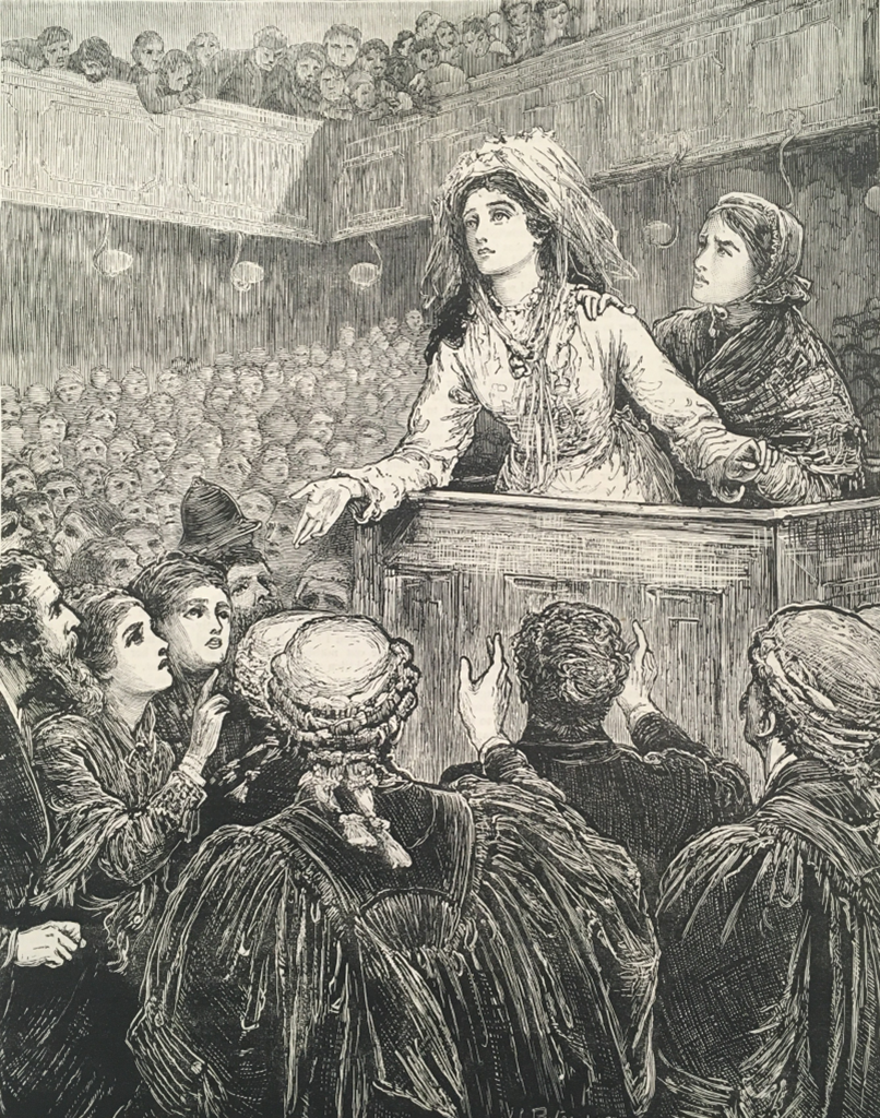 Woman pleading at a podium