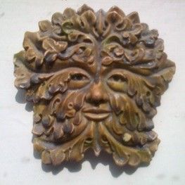 a carving of a man's face