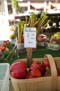 Produce at Kingston's downtown market: "Red Peppers - 2.00 each, Ont."