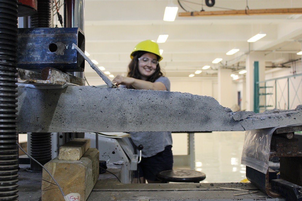 Student working at Queen's civil engineering lab