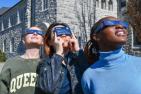 Group wearing eclipse glasses
