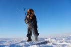 [Photo of George Konana collecting ice by Saskia de Wilde]