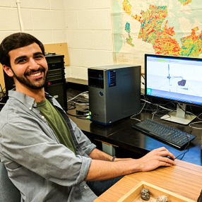 Fouad working on the Canadian Digital Geological Database