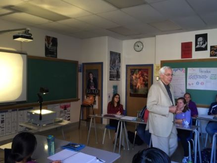 Image of Geoff Smith walking through a classroom at KCVI