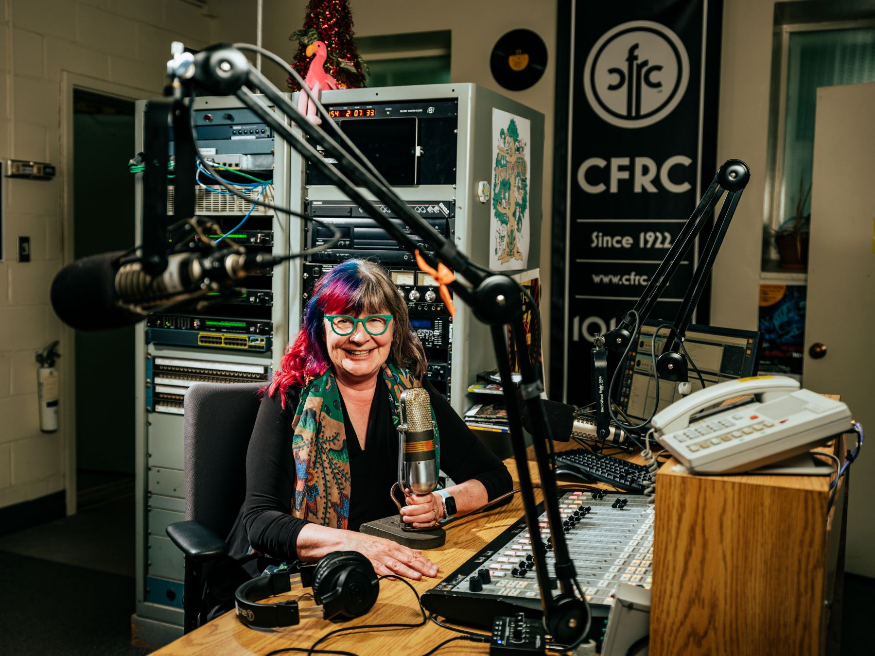Woman sitting in CFRC radio booth