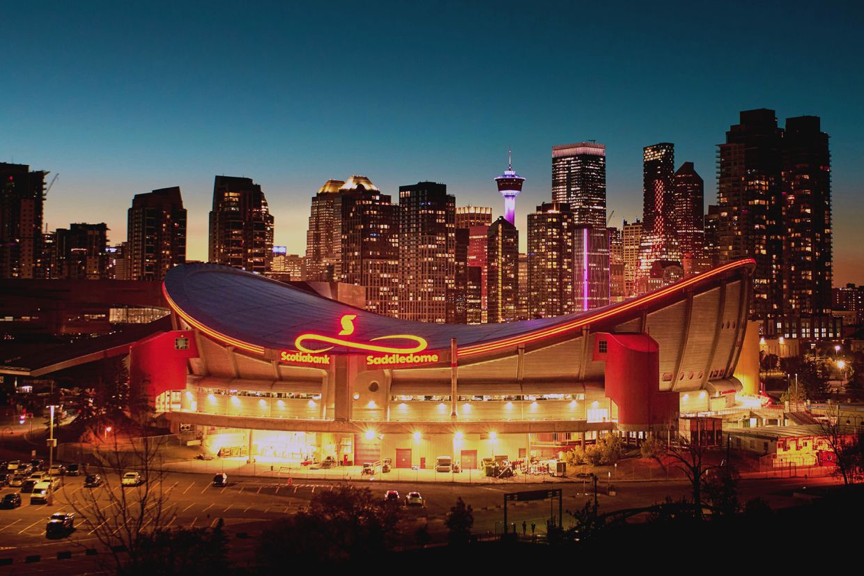 A view of the Saddledome and Downtown Calgary at sunset