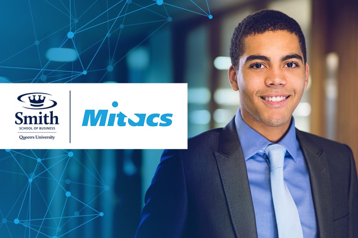 Smith And Mitacs Logo, Male in suite smiling 