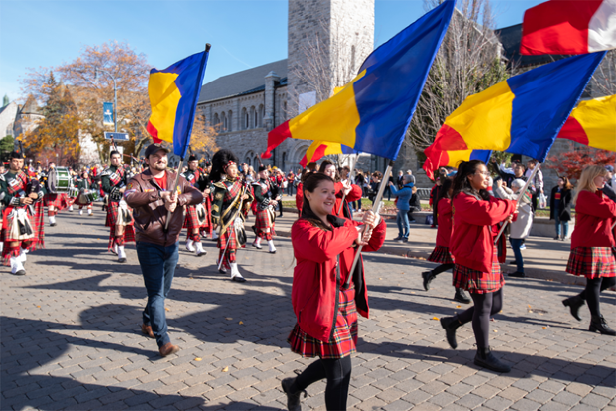 Homecoming parade with flagbearers