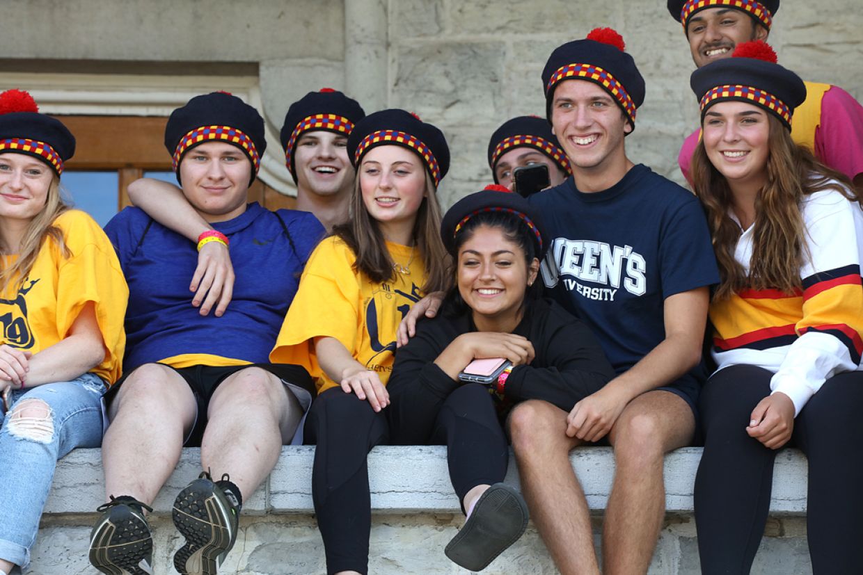 A group of students wearing tams