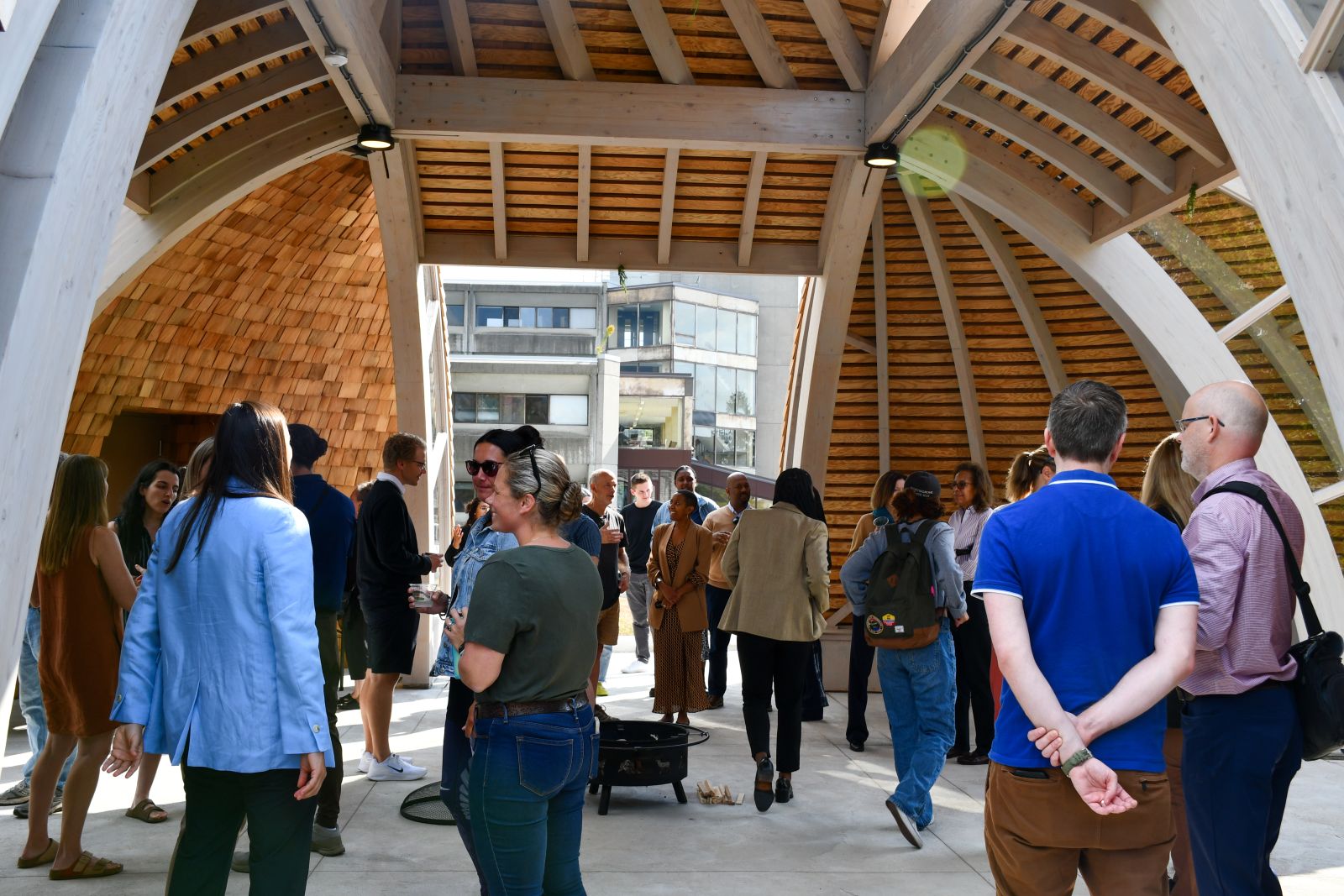 People gathered inside the new Indigenous space at Queen's University.