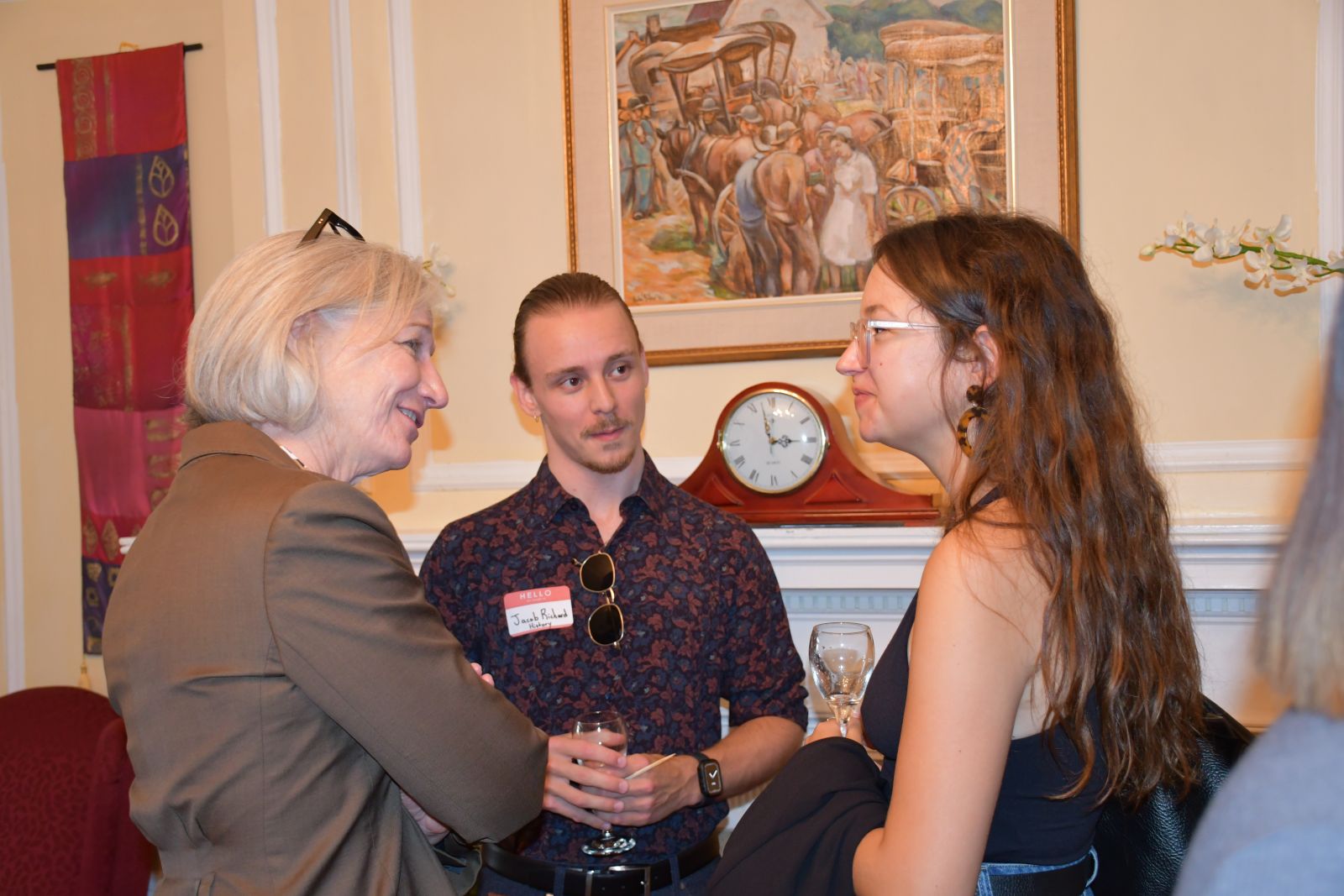 Dean Barbara Crow chats with award winners Jacob Richard and Milana Leskovac