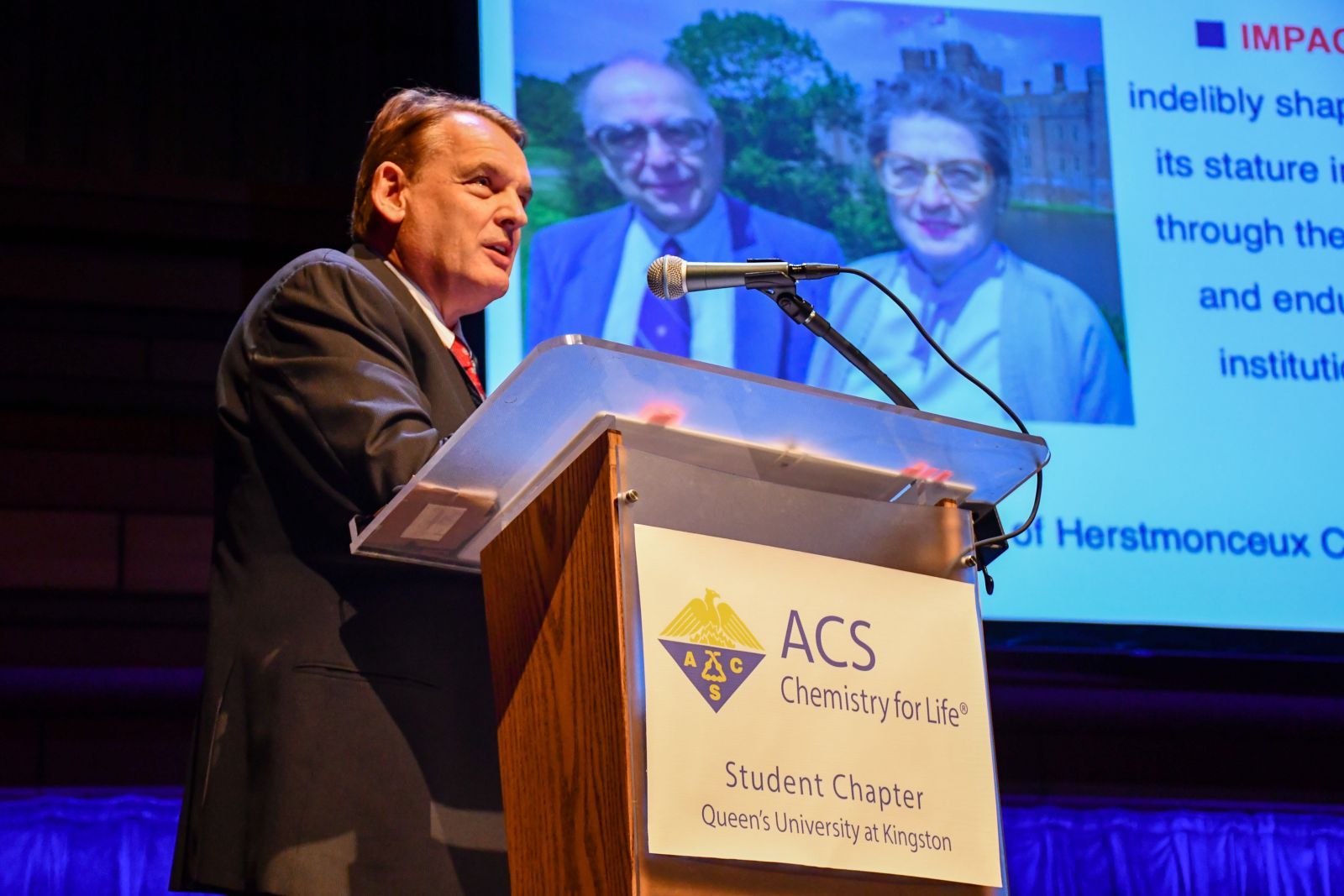 Dr. P. Andrew Evans, Bader Chair in Organic Chemistry (Queen’s University), addresses the symposium.