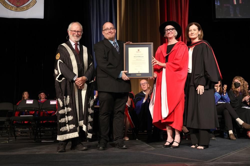 Left to right: Principal Patrick Deane, Baillie Award recipient Brian Wilkinson, Dean Barbara Crow, and Dean Ann Tierney.