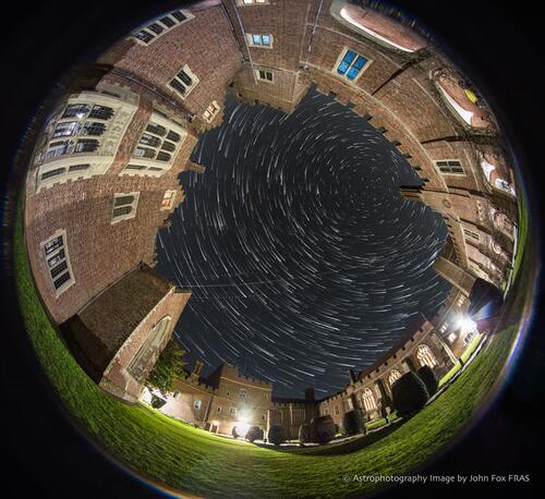 A Fish Eye lens captures the sky above the Courtyard