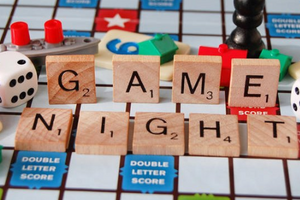 Scrabble tiles spelling out "Game Night"