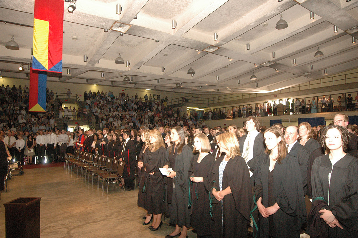 [students at the graduation ceremony in Jock Harty Arena]