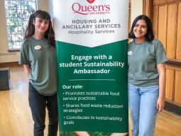 Sustainability Ambassadors standing with a banner