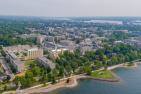 Aerial view of Queen's from the lake with Kingston in the background