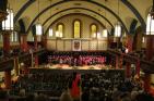 Grant Hall is filled with people for a convocation ceremony