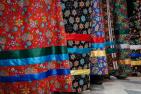 A collection of vibrant ribbon skirts made by students at Four Directions Indigenous Student Centre