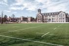 Nixon Field with Kingston and Grant halls in the background.