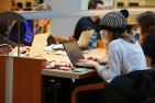 Students studying in library