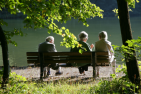 [Older adults on bench]
