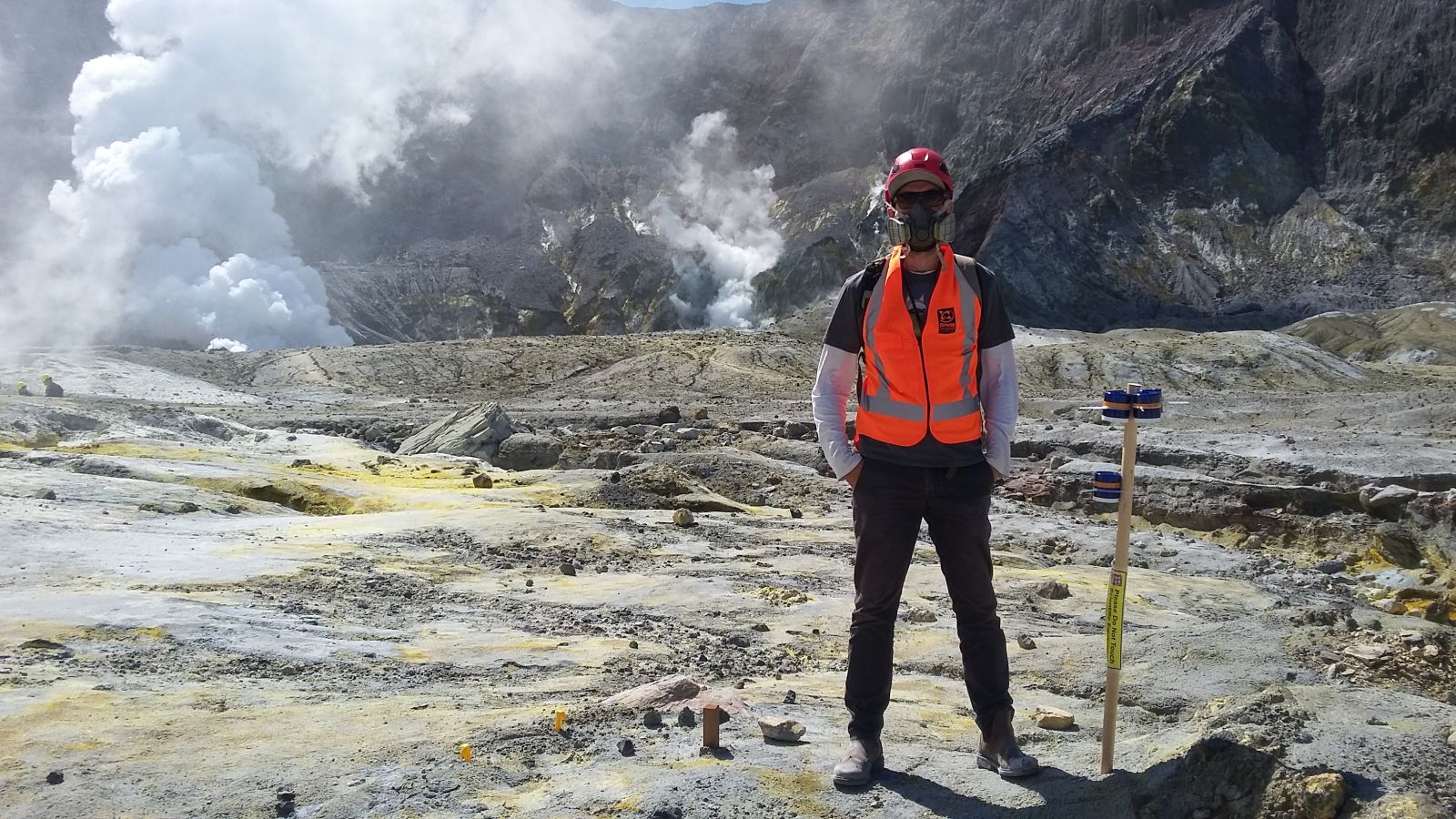 David McLagan stands on the volcanic Whakaari (White Island) in New Zealand. He was there measuring Mercury emissions from volcanic sources.