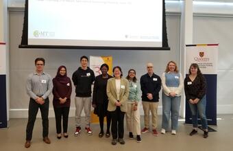 The participants of the first 3-Minute Thesis heat on March 12, 2024 pose for a group photo.