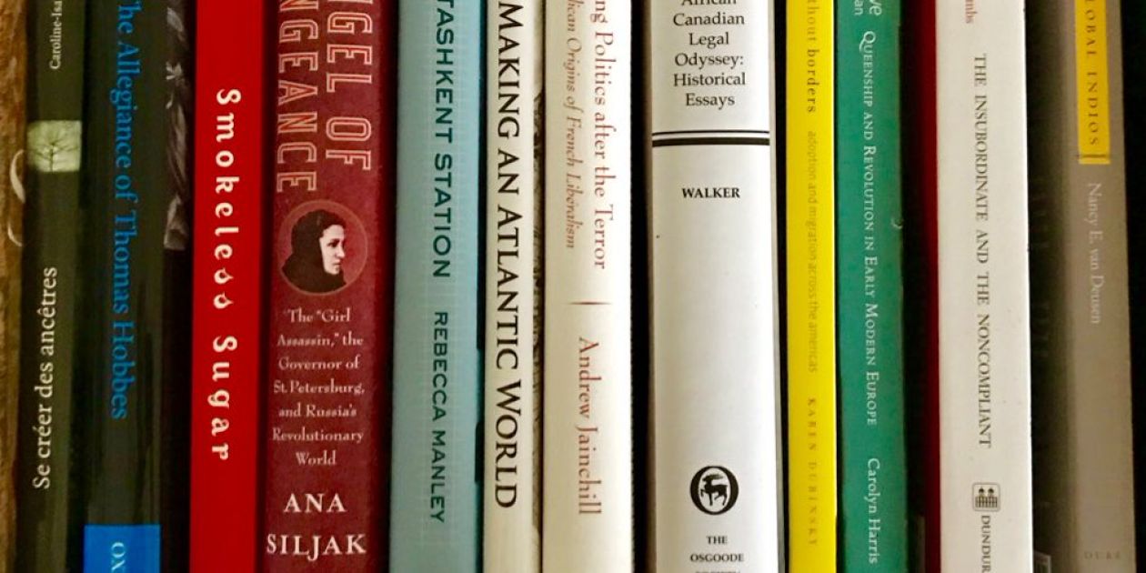 An image of a row of books written by History faculty 