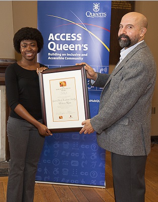 Employment Equity Award recipient Queen's Black Academic Society (QBAS) accepted by Victoria Nkunu.