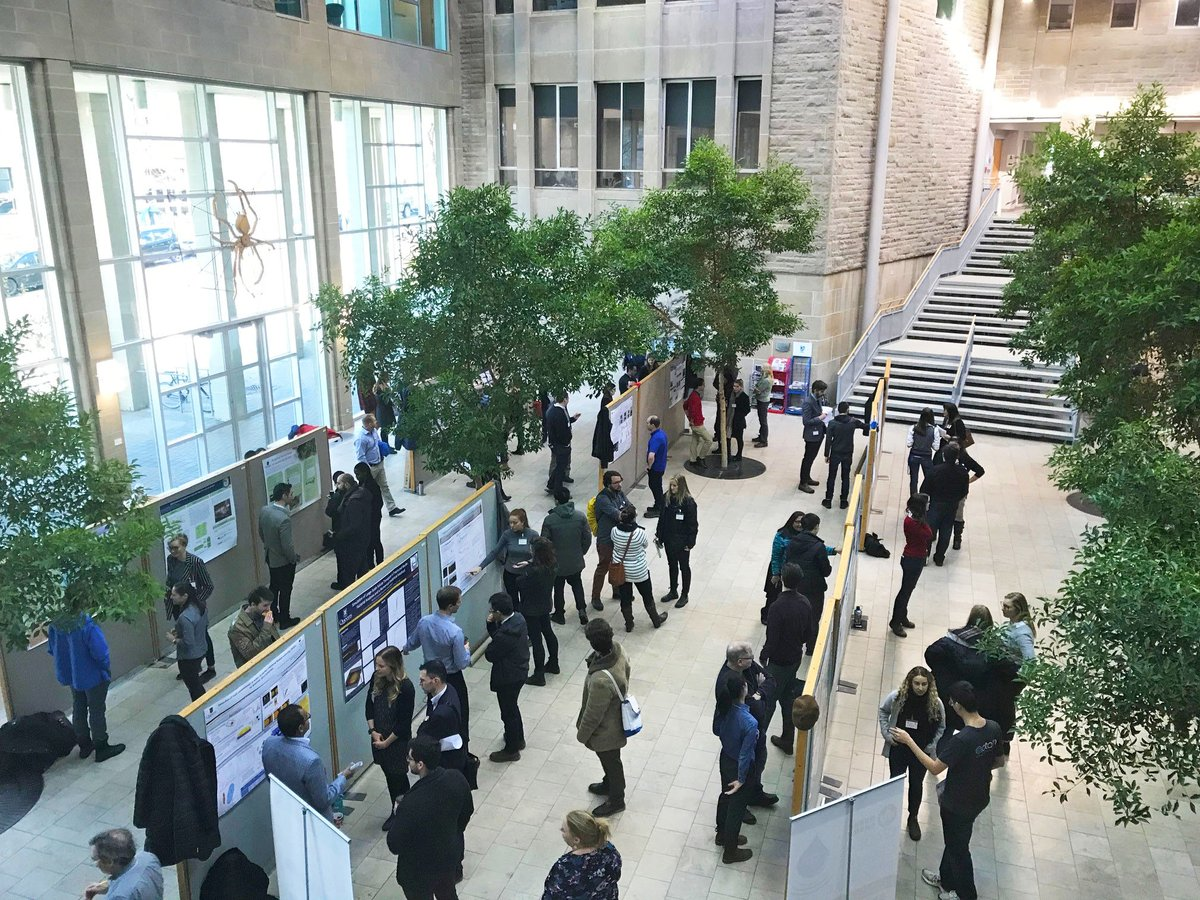 "An overhead view of the crowded Biosciences Complex atrium at Queen's University, where the BWRC forum took place"
