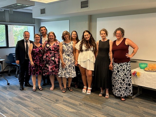 photo of LLCU Dept's Summer 2024 graduates, with professors and staff