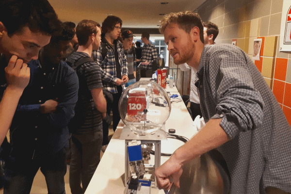 Jacob Morrison showing the glass sphere display