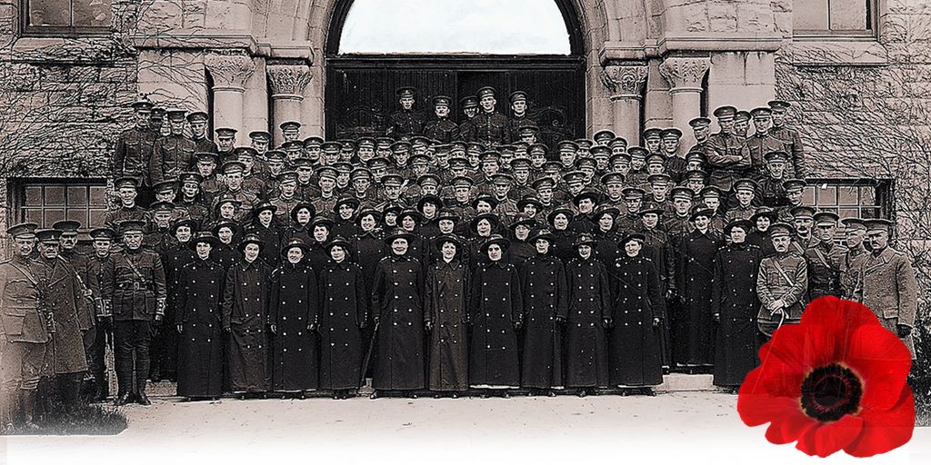 Four rows of soldiers standing in front of Ontario Hall