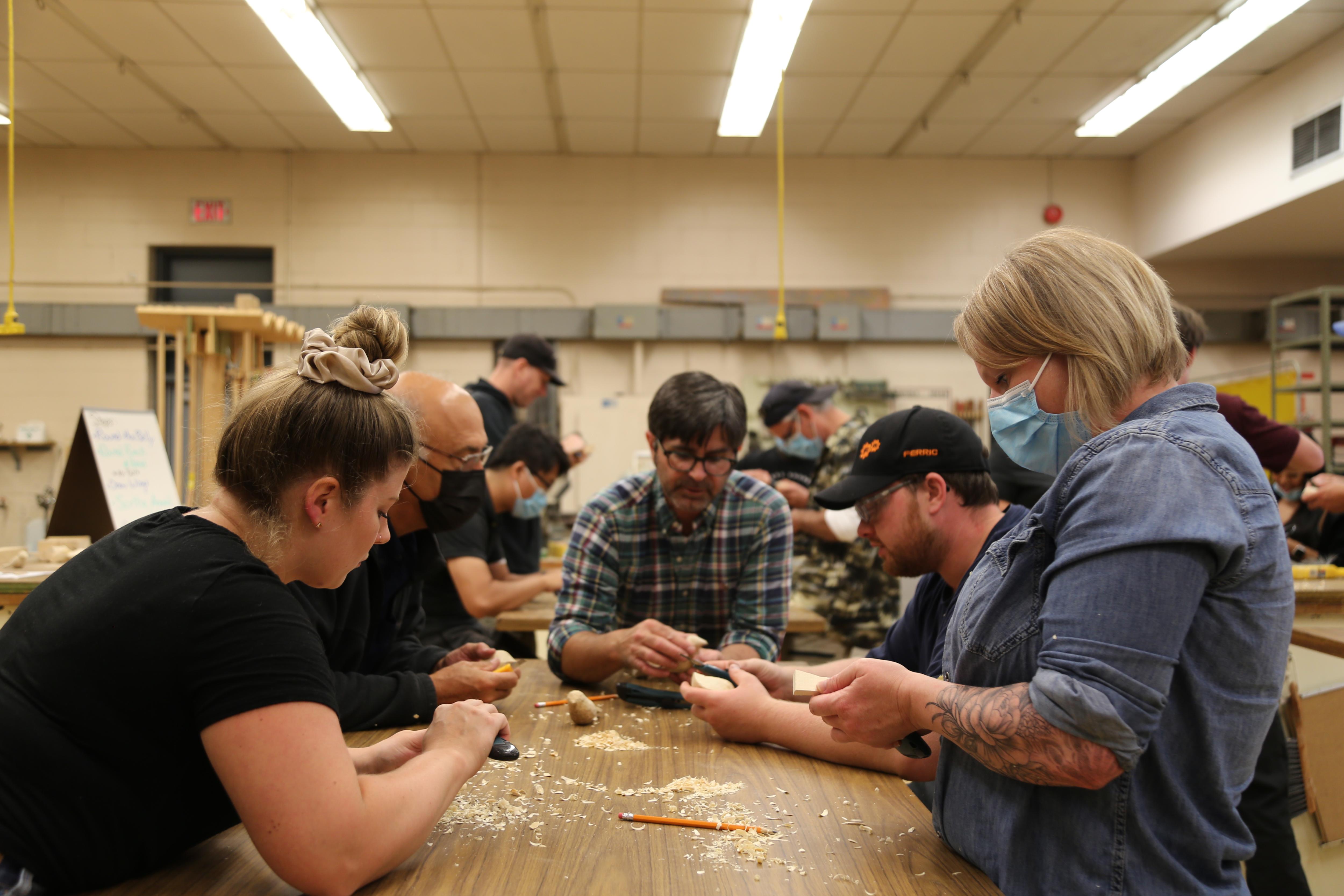 Students create a woodworking piece during a technological education class