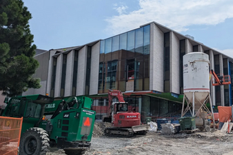 Construction vehicles outside the JDUC building